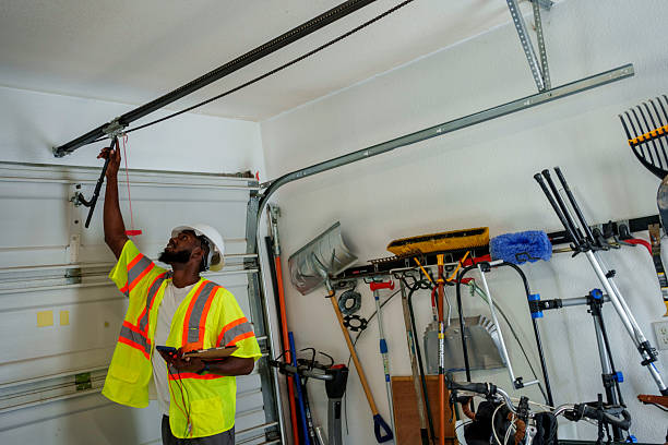 Professional Garage Door Panel Replacement technician working in Atkins, IA